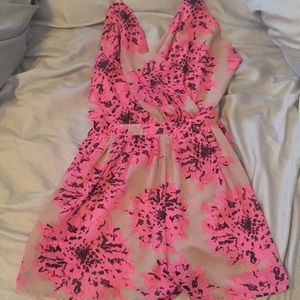floral romper with adjustable straps and low back